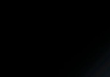 A mostly black image with a faint gradient at the bottom right corner.
