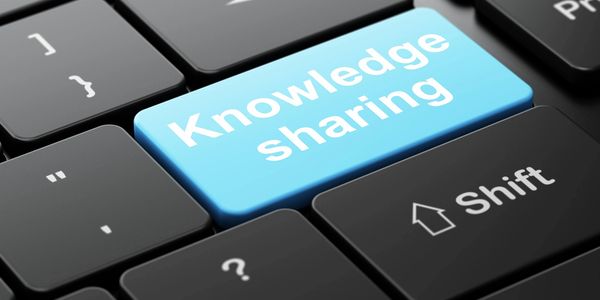 Keyboard key labeled Knowledge Sharing.