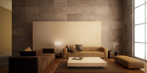 Minimalist modern living room with brown tones and large window.