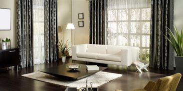 Drapery installation by a professional drapery installer or curtain installer.