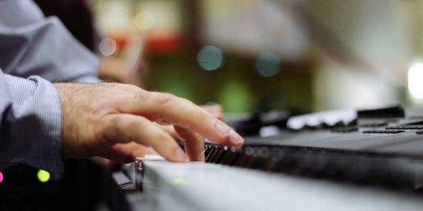 Person typing on a computer keyboard