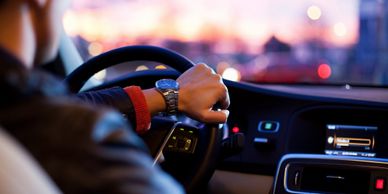 Man driving a vehicle with a car starter