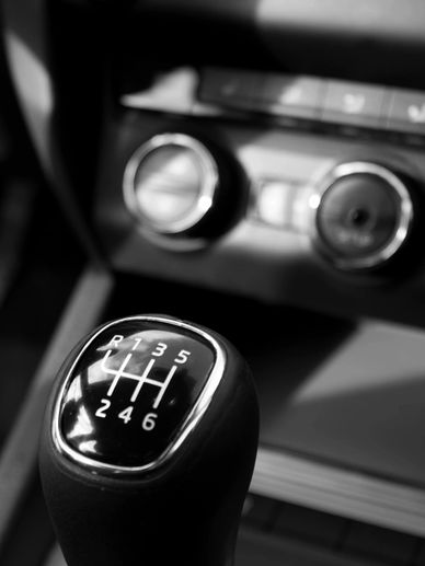 A close up of the shift knob on a car