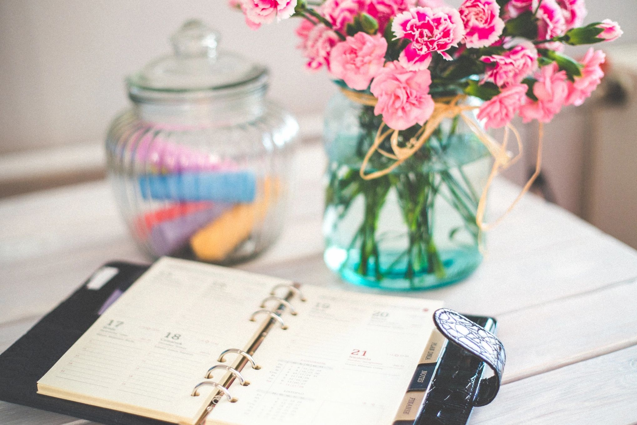 flowers and diary on a table