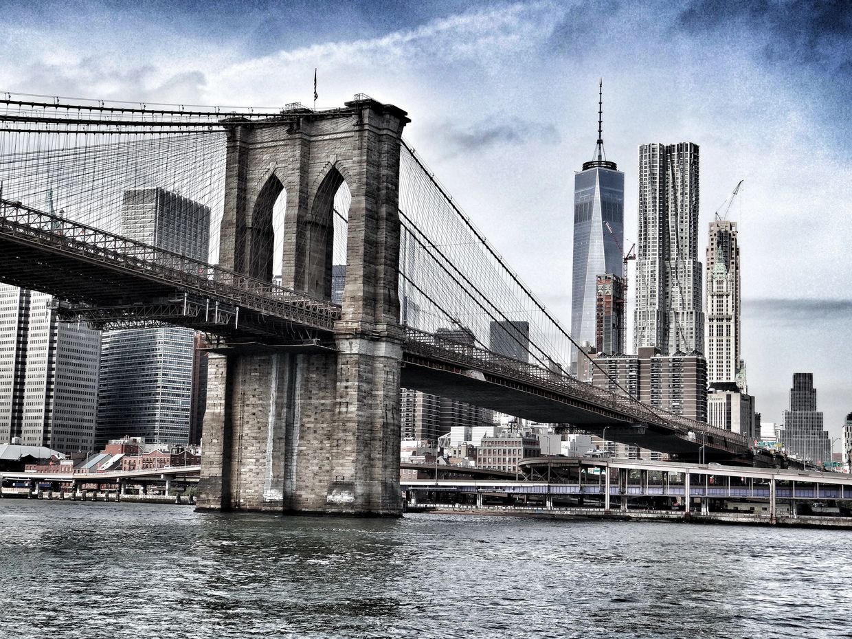 Brooklyn Bridge transition infrastructure symbolizing Bridge-to-DSCR real estate financing, metropol