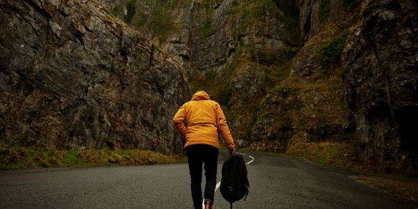 Person Hiking through mountain pass