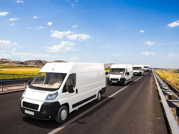 delivery cars on the highway