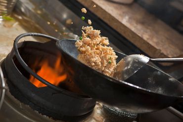 cooking rice using a wok