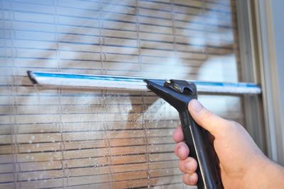 Window cleaning with a squeegee method.