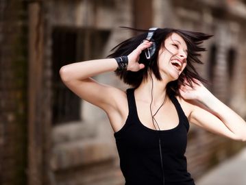 happy girl listening to your music