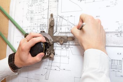 A man making shop drawings in New Zealand