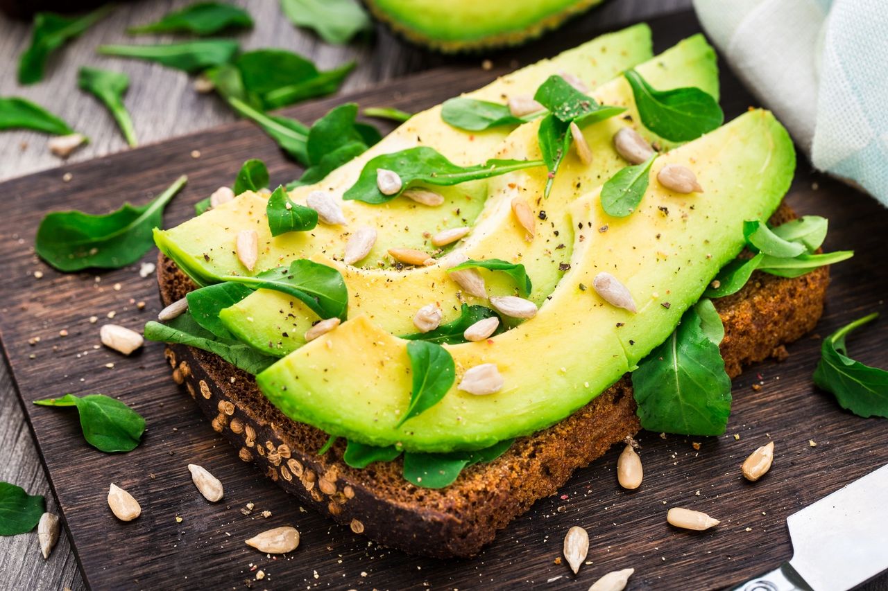 Avocado and pinenuts on bread