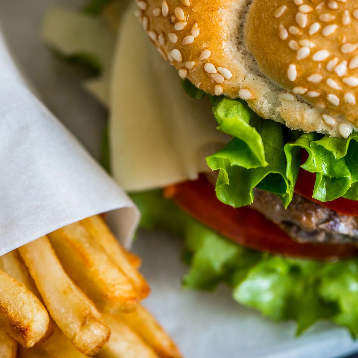 Cheeseburger and fries served at a restaurant whose owner outsources bookkeeping and sales tax. 