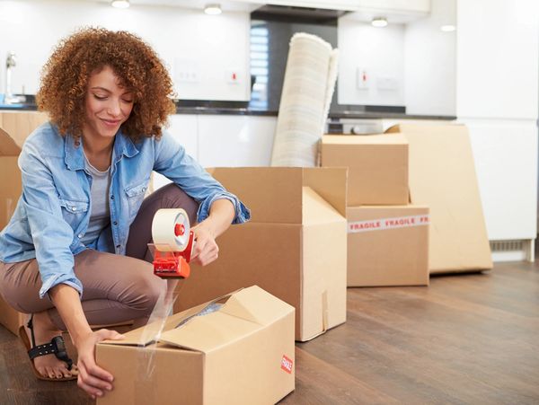 the woman pack boxes