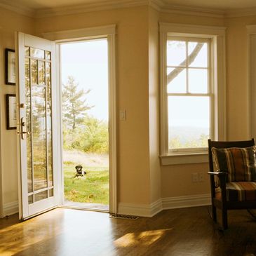 Double Hung windows and entry door.
