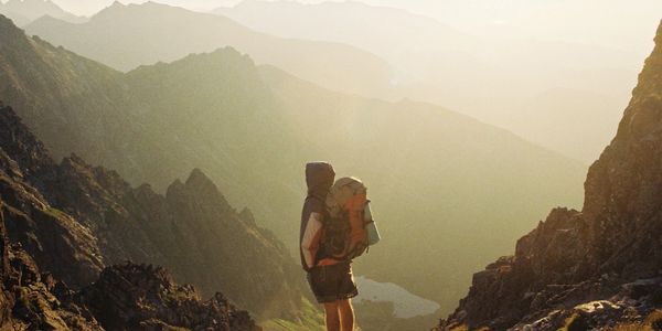 person looking at mountains