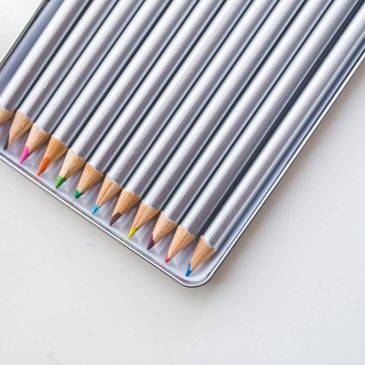 Tin of colored pencils