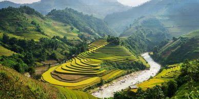 Mekong River surrounded by green mountains, Cambodia, vacation to Asia, luxury 