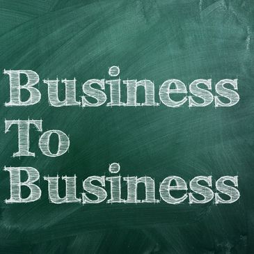 Chalkboard with the words 'Business To Business' written in white.