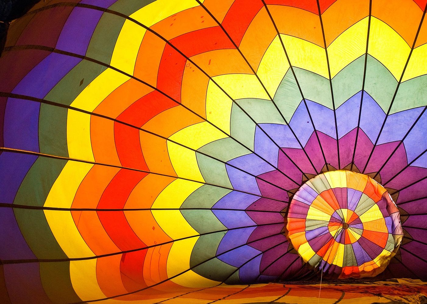 The many colours of the rainbow in a parachute.