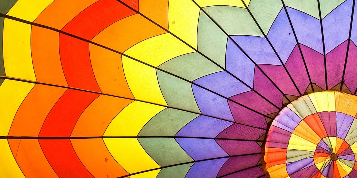 Inside a colorful hot air balloon. 