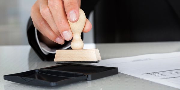 Notary stamp and ink pad.