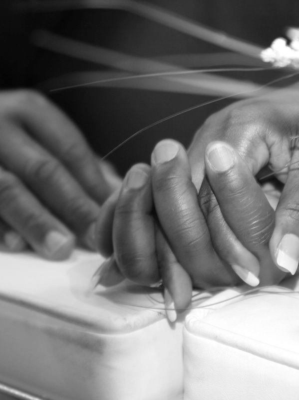 black and white photo, couple holding hands