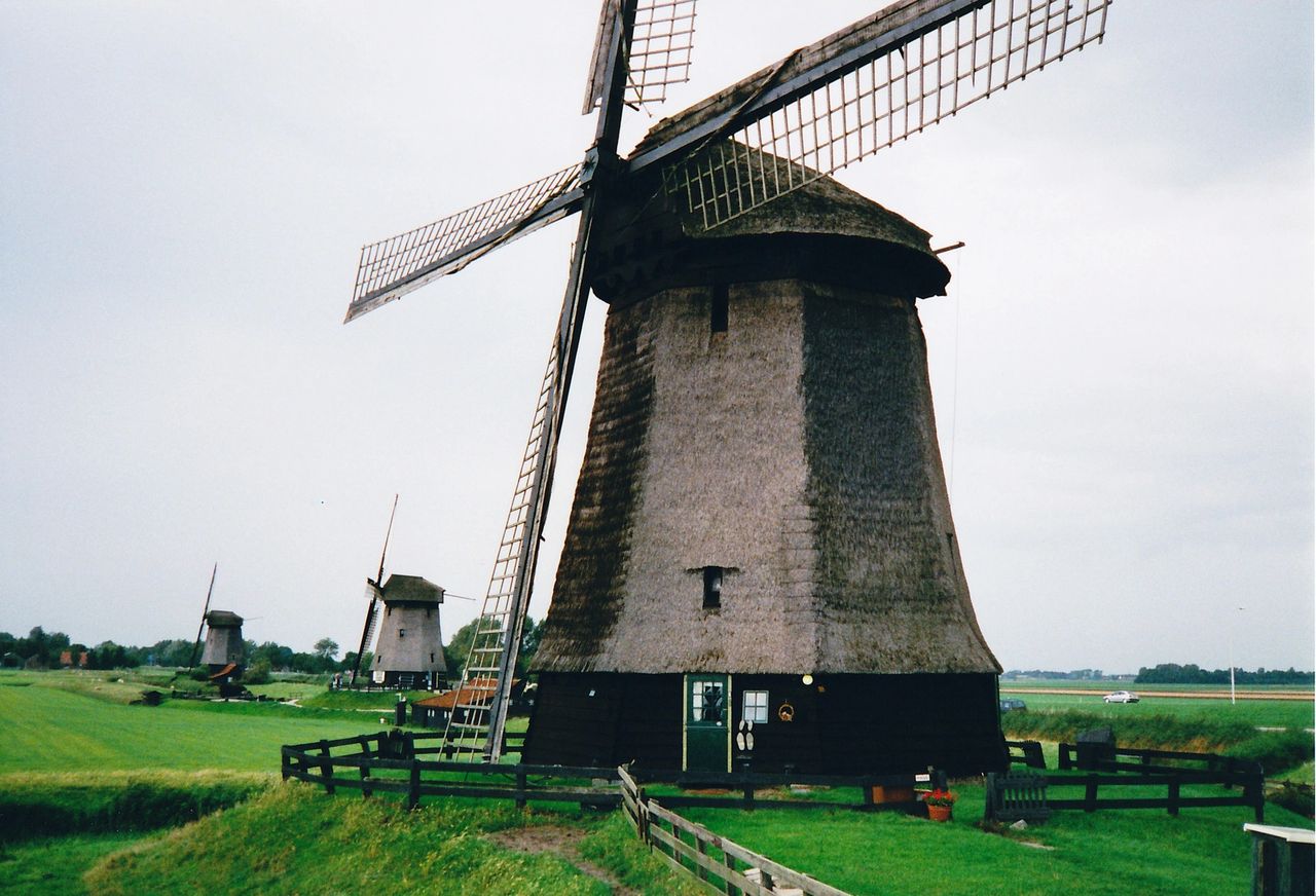Windmill in grassy plains