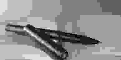 Image of pen on book. Editing & proofreading for large projects and government and private tenders 
