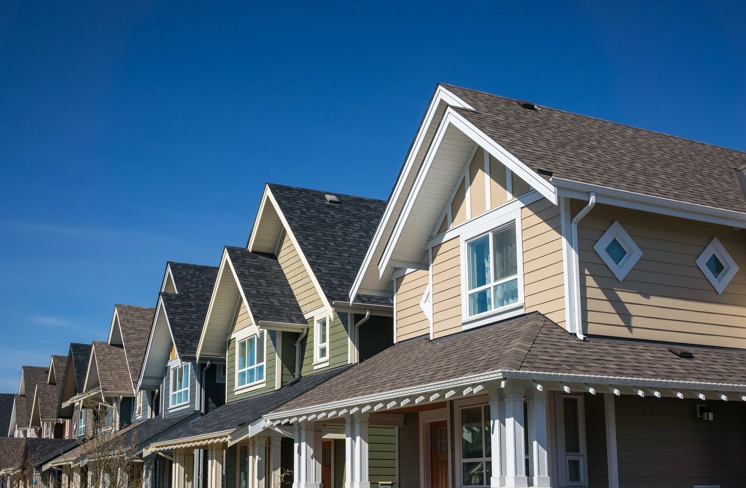 Row of beautiful well kept and modern homes.