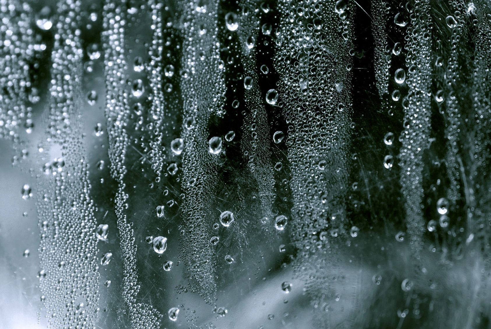 Photo of rain on a window.