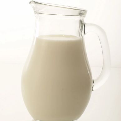 Human milk in a glass jar