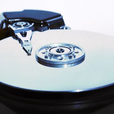 A hard drive disassembled for advanced data recovery
