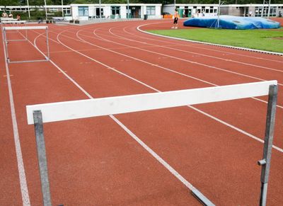 Empty hurdle on a running track.