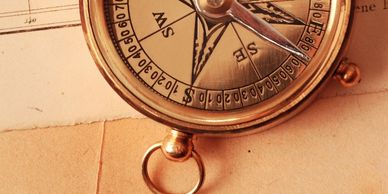 Compass, map and mirror are tools Ex-L coaches use to help leaders, groups and teams explore