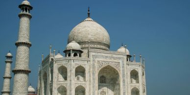 The Taj Mahal under clear blue sky.