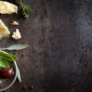 Olives and Cheese on a table