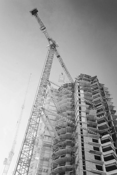 A large building being constructed containing elevators. Commercial Elevator Installation.