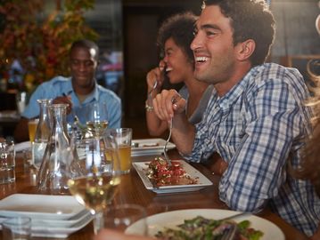 happy people enjoying a meal 