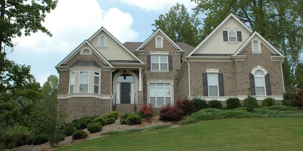 A residential house undergoing pressure washing in Central Chesterfield, Virginia