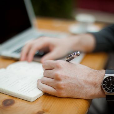 manager taking interview notes