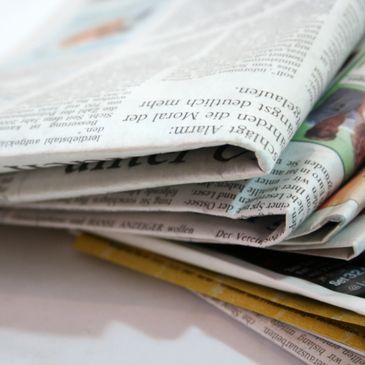 Stock photo of folded newspapers.