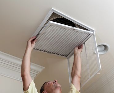 Technician completing an Air filter replacement 