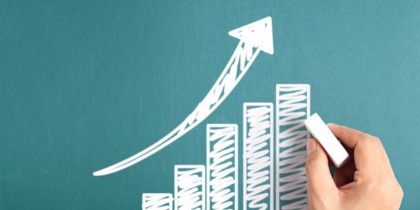 White chalk drawing of a bar graph to demonstrate results