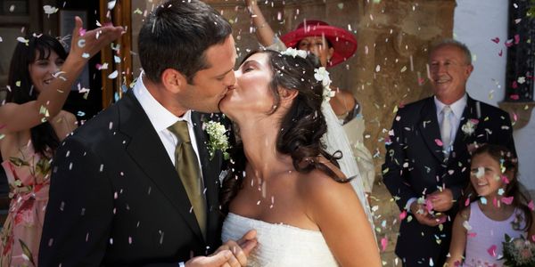 couple kissing at wedding  premarital coaching