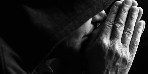 man in hooded jacket. PTSD sufferer