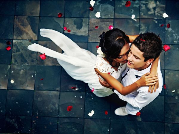 Bride and groom embracing