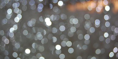 Soft, blurry spheres of light represent beautiful energy