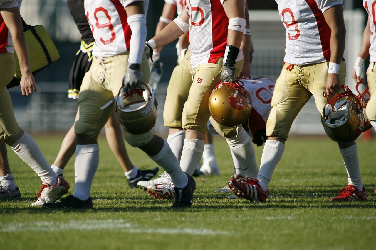 Football team walking from field