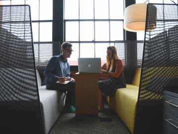 Management Consultant speaking with a client